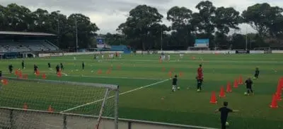 Kids play football at Seymour Shaw Park