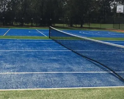 Eastern Ranges School tennis court field