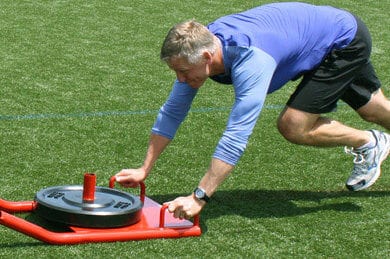 man exercise at grass field