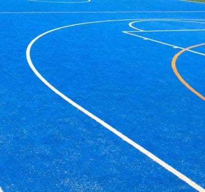 All Saints Catholic Primary School with bright new TigerTurf court