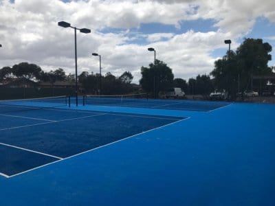 Two-tone blue TigerTurf Elite tennis court
