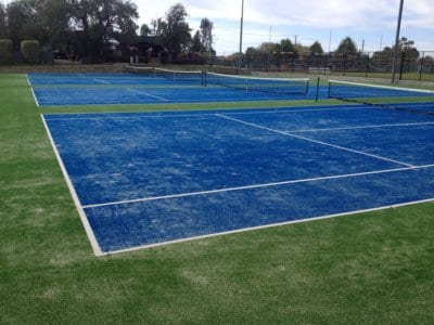 Cool blue in a green setting at the Shepparton Lawn Tennis Club at Shepparton Lawn Tennis Club