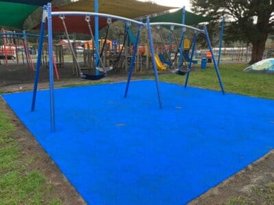 blue turf with swings
