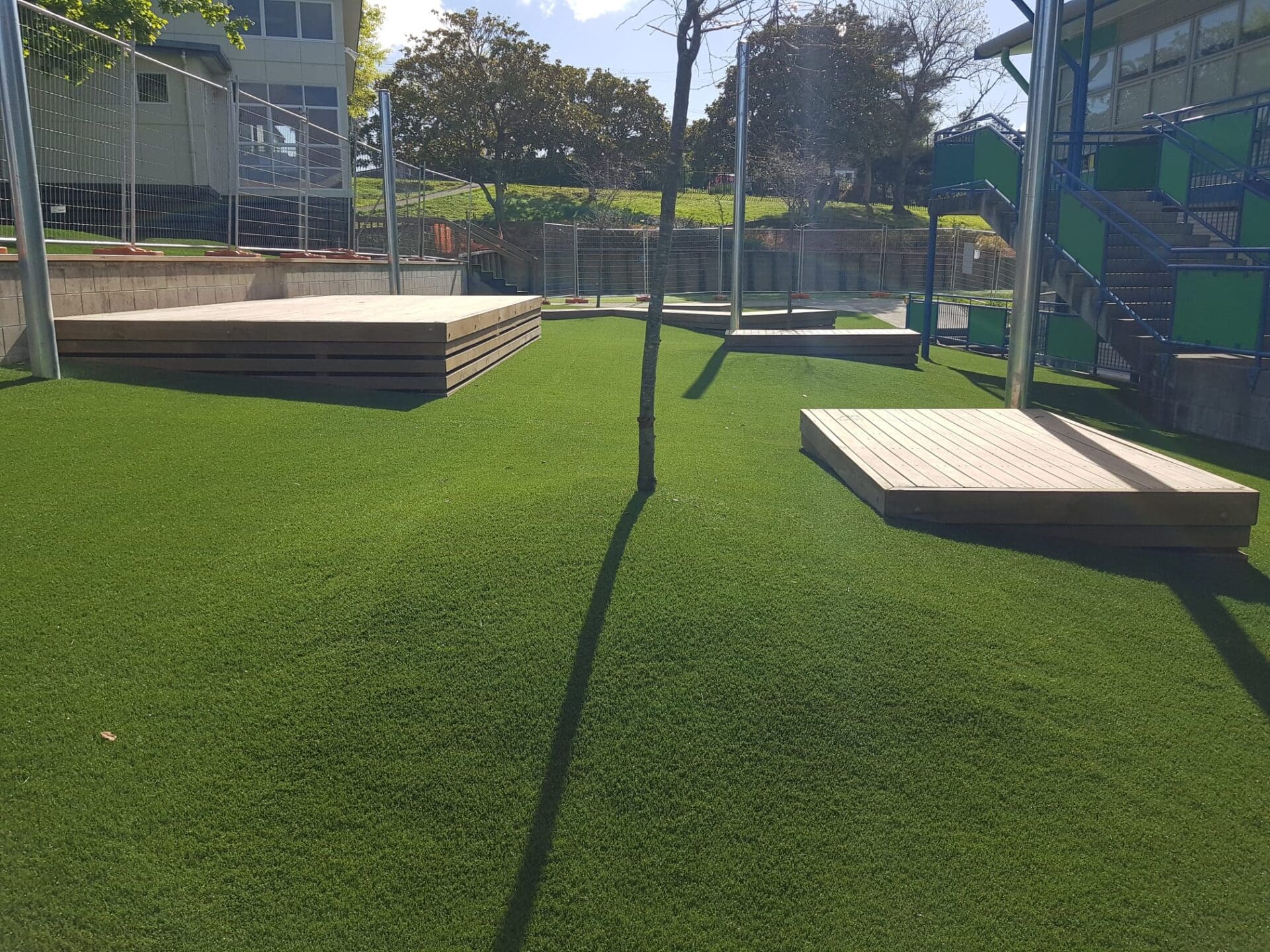 TigerTurf Envy XWR over a free-draining base, with a shade cover above – the perfect lawn
